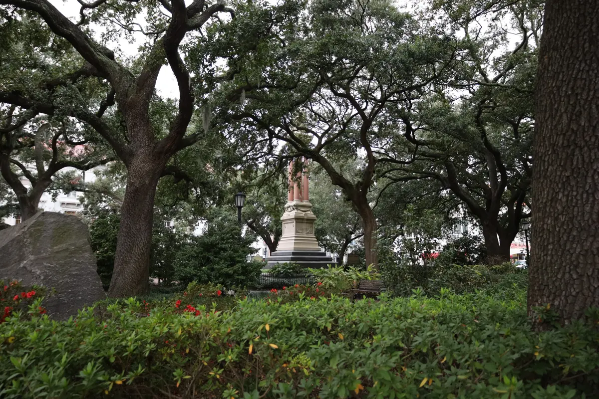 Oaks and monuments in Wright Square at the heart of the Historic District, ground covered by Savannah GA ghost tours